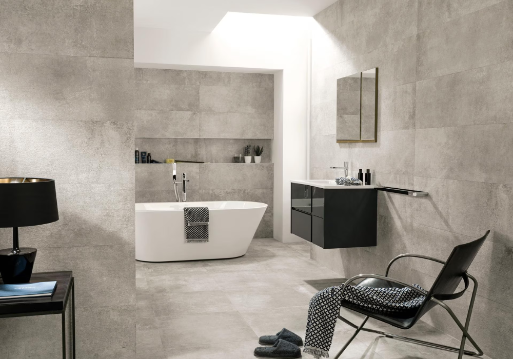 Phòng tắm hiện đại, sống động với những bề mặt hiệu ứng xi măng cá tính kết hợp cùng nội thất kim loại